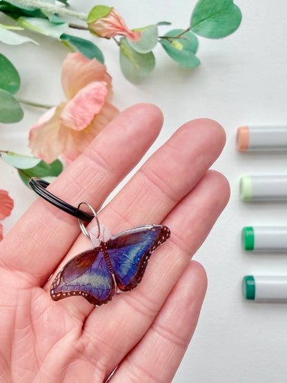 Hand-Illustrated Blue Morpho Butterfly | Handmade Acrylic + Resin Keychain/Bag Charm